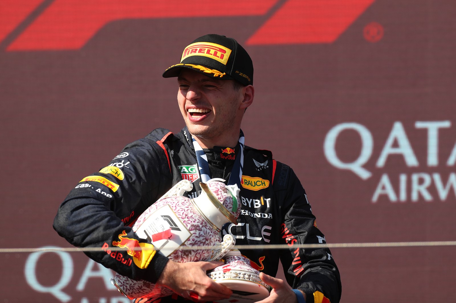 Race winner Max Verstappen celebrates on the podium during the F1 Grand Prix of Hungary at Hungaroring, Budapest, Hungary, July 23, 2023. (Getty Images Photo)