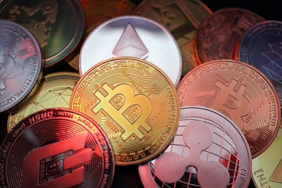 Representations of cryptocurrencies including Bitcoin, Dash, Ethereum, Ripple and Litecoin are seen in this illustration picture taken June 2, 2021. (Reuters Illustration)